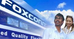 Der Schein trgt: Lchelnde Foxconn-Mitarbeiter auf der Firmen-Homepage