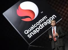 Qualcomm-CEO Steve Mollenkopf vor einem Qualcomm-Snapdragon-Logo